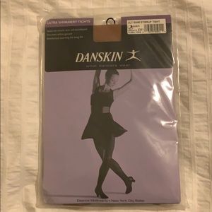 Danskin ultra shimmery tights size a, flesh tone
